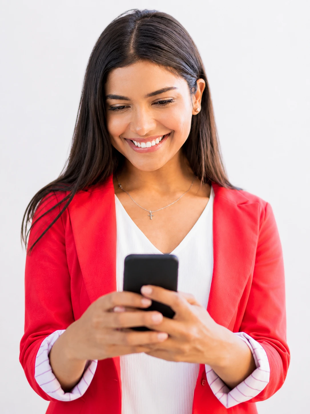 A customer smiling at her mobile app